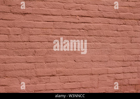 Very old brick wall texture background heavily painted in red brown color Stock Photo