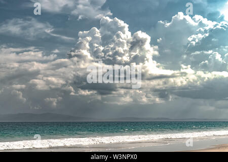 Landscape of Strange Weather Phenomenon due to Climate Change comprising dramatic Nimbus clouds at beach,in Rainy season during rough weather forecast Stock Photo