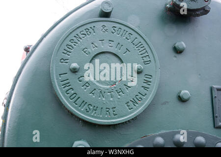 Close up of name plate on a Ruston Hornsby Portable Steam Engine. Stock Photo