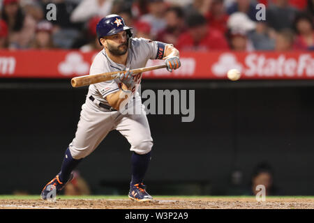 July 16, 2019: Houston Astros second baseman Jose Altuve (27) bunts for a single during the game between the Houston Astros and the Los Angeles Angels of Anaheim at Angel Stadium in Anaheim, CA, (Photo by Peter Joneleit, Cal Sport Media) Stock Photo