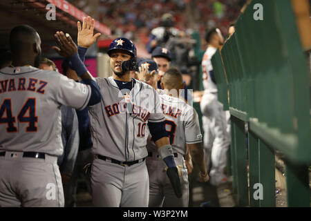 July 16, 2019: Houston Astros first baseman Yuli Gurriel (10) gets a high five after scoring a run during the game between the Houston Astros and the Los Angeles Angels of Anaheim at Angel Stadium in Anaheim, CA, (Photo by Peter Joneleit, Cal Sport Media) Stock Photo