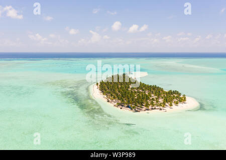 Tropical island surrounded by beautiful lagoons. Onok Island Balabac, Philippines. Rest on a tropical island. Nature of the Philippine Islands. Stock Photo