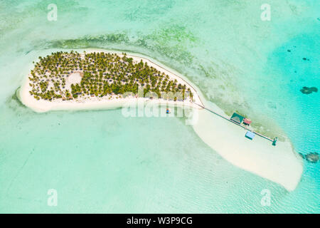 Tropical island surrounded by beautiful lagoons. Onok Island Balabac, Philippines. Rest on a tropical island. Nature of the Philippine Islands. Stock Photo