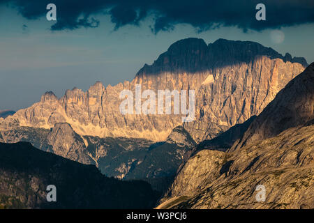 Sunlight at sunset on Monte Civetta (North west side) mountain peak. The Dolomites. Italian Alps. Europe. Stock Photo