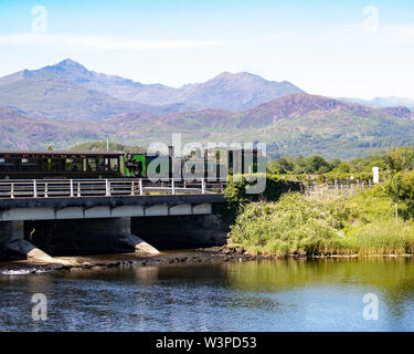 Ex South African Railways NGG16 Class Garratt 2-6-2+2-6-2 No. 143 crossing Pont Croesor viaduct on the Welsh Highland Railway Stock Photo