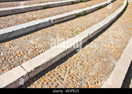 Paving and staircase made with white marble and stone pebbles Stock Photo