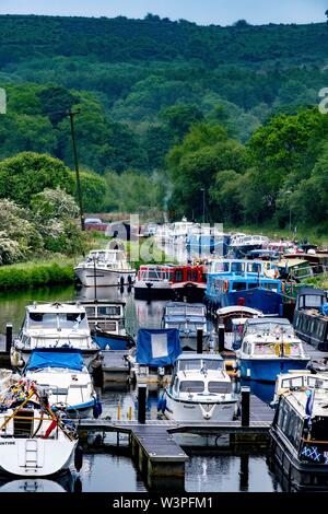 Boats, barges and canoes on Forth and Clyde Canal Stock Photo