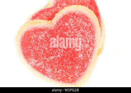 Two jelly sweet hearts covered with sugar isolated  - Valentine's gift Stock Photo