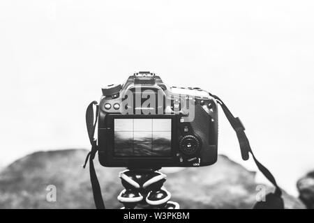 camera on a gorilla pod taking pictures of a landscape Stock Photo
