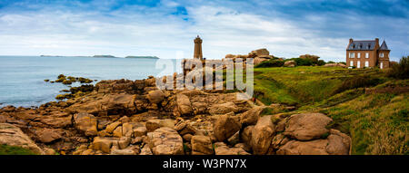 Ploumanach Mean Ruz lighthouse red sunset in pink granite coast, Perros Guirec, Cotes d'Armor, France Stock Photo
