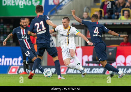 16 July 2019, Saxony, Dresden: Football, test match, SG Dynamo Dresden - Paris Saint-Germain, in the Rudolf-Harbig-Stadium. Dynamos Haris Duljevic (2nd from left) against the Paris Jense Rodriguez Ruiz (left), Ander Herrera (2nd from left) and Thilo Kehrer (right). Photo: Robert Michael/dpa-Zentralbild/dpa - IMPORTANT NOTE: In accordance with the requirements of the DFL Deutsche Fußball Liga or the DFB Deutscher Fußball-Bund, it is prohibited to use or have used photographs taken in the stadium and/or the match in the form of sequence images and/or video-like photo sequences. Stock Photo