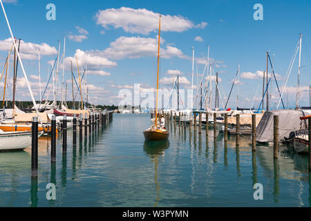 Konstanz, BW / Germany - 14. July 2019: wooden sailboat preparing to enter a berth in Konstanz harbor and docking Stock Photo