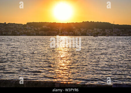 Beautiful panoramic view of the city at sunset, Argostoli town on Kefalonia island (Ionian island) in Greece. Stock Photo