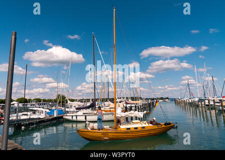 Konstanz, BW / Germany - 14. July 2019: wooden sailboat preparing to enter a berth in Konstanz harbor and docking Stock Photo