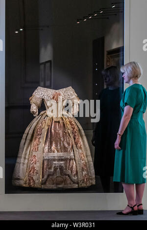 London, UK. 17th July 2019. Her costume for the Stuart Ball - Queen Victoria’s Palace a special exhibition at this year’s Summer Opening of Buckingham Palace to mark the 200th anniversary of the birth of Queen Victoria. It runs from 20 July – 29 September 2019 and tells the story of how the young monarch turned an unloved royal residence into the centre of the social, cultural and official life of the country. Credit: Guy Bell/Alamy Live News Stock Photo