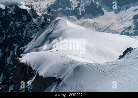 Mountaineers on a glacier in the French Alps Stock Photo