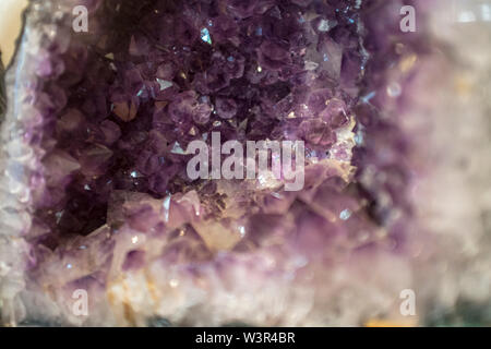 Close-up of an amethyst crystal.  Amethyst is a semiprecious stone often used in jewellery and is the birthstone for February. Stock Photo