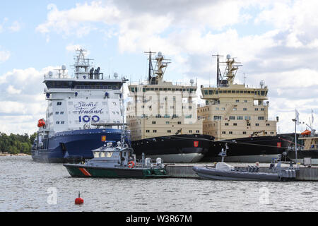 Icebreaker fleet stationed in the harbor of Katajanokka, Helsinki, Finland | Summer 2018 | The blue icebreaker on the left is Polaris, the most powerf Stock Photo