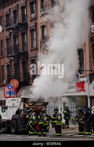 Street sweeper on fire in Park Slope Brooklyn NYC Stock Photo