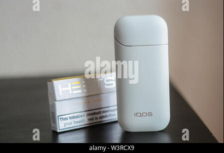 IQOS heat-not-burn tobacco product technology Stock Photo