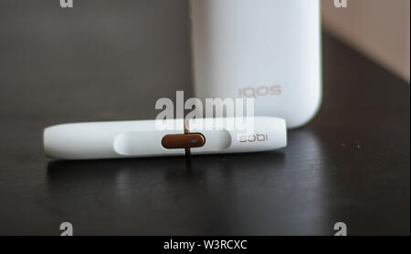 IQOS heat-not-burn tobacco product technology Stock Photo