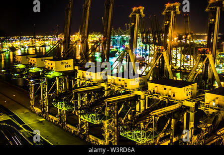 Singapore - April 25, 2018: Close up view of the quay cranes at Keppel Terminal operate by PSA Singapore. Stock Photo