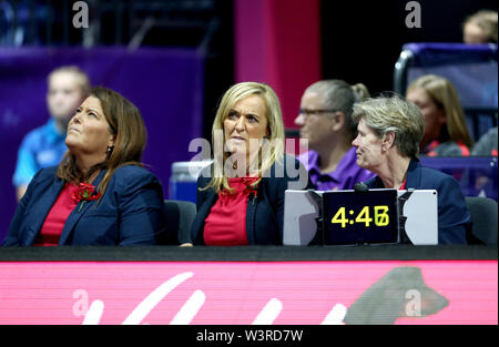 England coach Tracey Neville (centre) is presented with a bronze medal ...