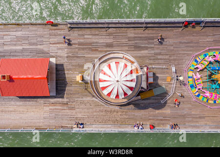 Clacton Pier Aerial View, Clacton-on-sea, Essex UK - top down image of helter skelter slide children's gravity ride. Stock Photo