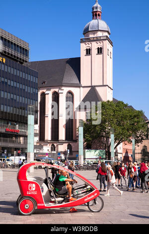 the church St. Mariae Himmelfahrt near main station, rickshaws for sightseeing, Cologne, Germany.  die Kirche St. Mariae Himmelfahrt nahe Hauptbahnhof Stock Photo