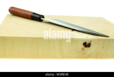 kitchen knife and wood butcher block countertop on white background Stock Photo