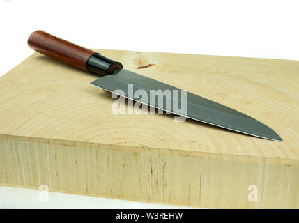 kitchen knife and wood butcher block countertop on white background Stock Photo
