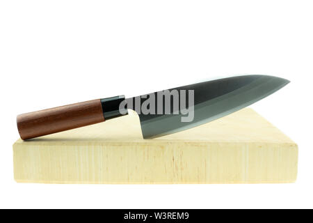 kitchen knife and wood butcher block countertop on white background Stock Photo