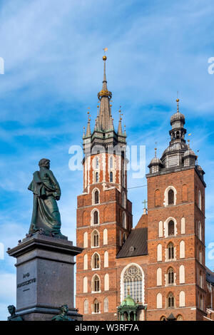 Adam Mickiewicz Monument and Saint Mary Basilica, Krakow, Poland Stock Photo
