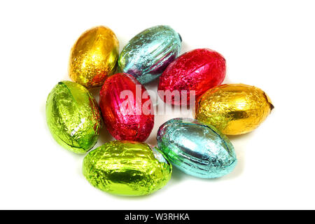 Colorful chocolate Easter eggs over white Stock Photo