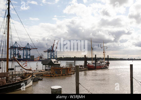 Restored historic sailing ships and working boats are on view at the open-air Museumshafen Oevelgönne along the Elbe River in Hamburg, Germany. Stock Photo