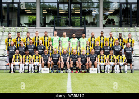 ARNHEM, 17-07-2019, Dutch football, Eredivisie, Papendal, season 2019/2020, photocall Vitesse, back row (L-R): Matus Bero, Armando Obispo, Oussama Darfalou, Rasmus Thelander, Jay-Roy Grot, Jeroen Houwen, Remko Pasveer, Kostas Lamprou, Bilal Bayazit, Tim Matavz, Danilho Doekhi, Tomas Hajek, Riechedly Bazoer, Julian Lelieveld Middle row (L-R): Chris van Dee (kit man), Mirjam Clifford (team manager), Jesper Gabri‘ls (physiotherapist), Kevin Balvers (video-analist), Oussama Tannane, Mukhtar Ali, Thomas Buitink, Richie Musaba, Max Clark, Jan van Norel (physical coach), Pieter Sengkerij (club doct Stock Photo