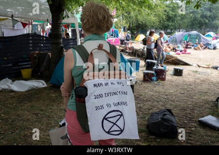 Extinction Rebellion camp in Waterloo Millennium Green on 17th July in London, England, United Kingdom. Extinction Rebellion is a climate change group started in 2018 and has gained a huge following of people committed to peaceful protests. These protests are highlighting that the government is not doing enough to avoid catastrophic climate change and to demand the government take radical action to save the planet. Stock Photo