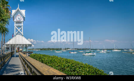 Sailboats docked near to the historic Bradenton Beach pier on Anna Maria Island, Florida. Stock Photo