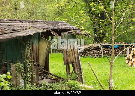 Ruined wooden hut in the garden (Germany, Europe) Stock Photo