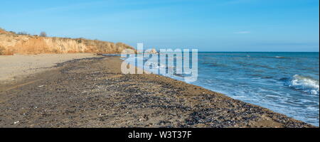 Sea coast dotted with mussel shells on the seashore near Odessa, Ukraine Stock Photo