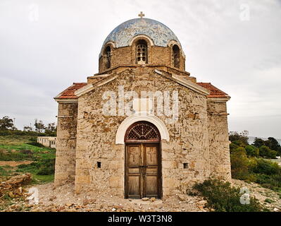 Old ruins of Agios (Saint) Ioannis (John) Prodromos orthodox church , on a cliff in Sounio, Attica Greece . Stock Photo