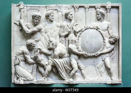 FLORENCE, ITALY - MAY 10, 2019: Roman art, relief with Sacrificial Scene, second quarter of the 2 century AD in the Uffizi Gallery, Florence Stock Photo