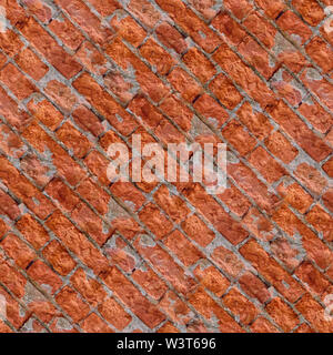 Abstract seamless texture for designers with red broken blocks wall. May using for game development of for design projects. Stock Photo