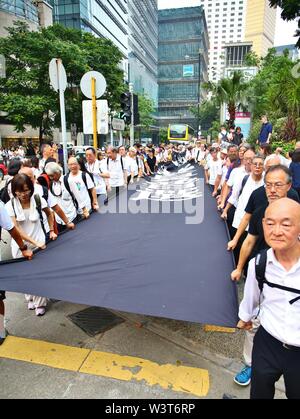 Hong Kong, China. July 17th, 2019. A few thousand Hong Kong senior citizens march in a show of support for the youths protest against a controversial extradition bill. Credit: Gonzales Photo/Alamy Live News Stock Photo