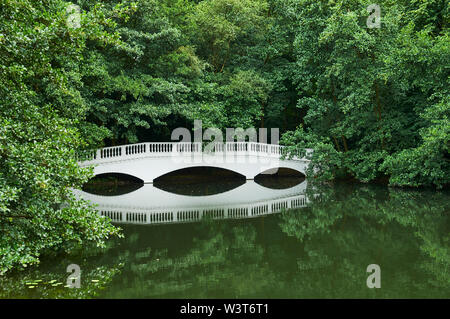 Pond with the restored Sham Bridge on Hampstead Heath, north London UK, in the grounds of Kenwood House Stock Photo