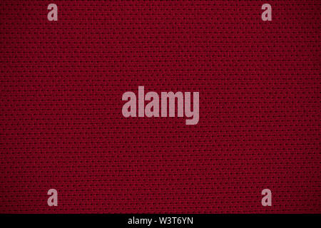 Texture of real burgundy knitwear, textile background. Stock Photo