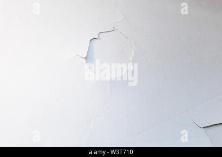 Abstract background. White old wall with whitewashed flown. Stock Photo