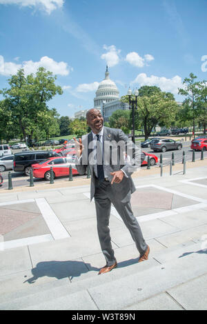 Washington DC, July 17, 2019, USA: Retired NBA Star, John Salley arrives at the annual PETA (People for the Ethical Treatment of Animals) veggie dog lunch in front of the Rayburn House office building in Washington DC. PETA provided meat free hot dogs to crowds outside the building. Patsy Lynch/MediaPunch Stock Photo