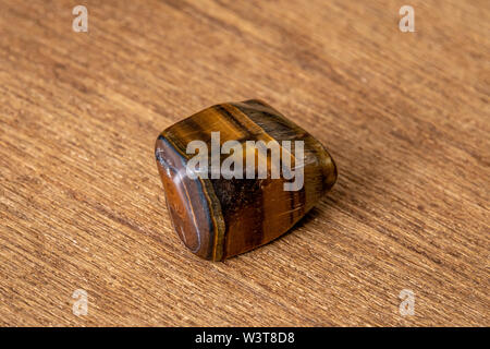 Tiger eye gemstone beautiful gemstone shining in yellow and brown Stock Photo