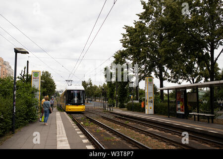 A tram arriving at Björnsonstrasse in Berlin, Germany. Stock Photo